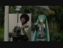 初音ミクさんの横で「傘がない」を弾き語ってみた／アフロ
