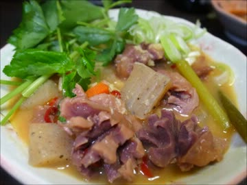 酒の肴の砂肝にんにく味噌煮込み