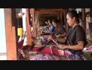 来馬哲二　Woman Weaving in a Workshop