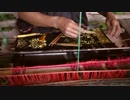 来馬哲二　Woman Weaving on a Loom with Bobbins