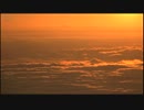 オレンジ色の雲と天文台　國井洪
