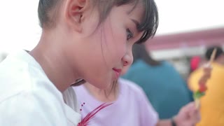 Asian Children Little Girl Eating Japanese Sushi Roll With Chopsticks.　代沢インターナショナル