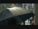 People Walking Through Rain Under Umbrellas　上村憲司