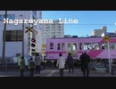 朝の踏切を通過する流山線の電車