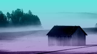 hut floating on the surface of the fog