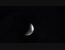 暗雲の中を進んでいく月　Moon and dark clouds
