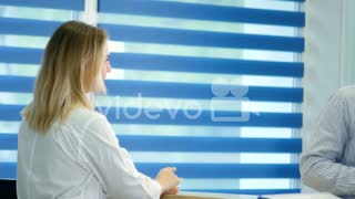 Male patient with sore throat getting doctor appointment at the reception　okirakuhuhu