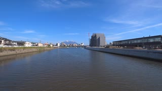 ある日の桜島（その３５６）＜再開発の進むJR谷山駅周辺と永田川と桜島＞