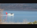 Twin Engine Pontoon Plane Takes Off