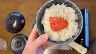 明太子としらすで土鍋で炊いた飯を食う