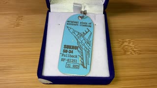 ウクライナで撃墜されたSu-34の一部から作られたキーチェーンKeychain made from piece of an Su-34, shot Down in Ukraine