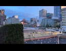 Overlooking the blue sky and the city of Shinjuku Station. 鈴木功三