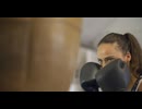 CU of Boxer Punching Boxing Bag