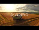 Drone footage of golden fields and combine harvester1