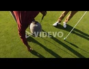 Video of midsection of diverse male friends playing golf on golf field