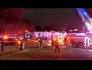 Fireman put out the fire of the house in Mississauga, Ontario, Canada