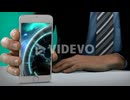 Hand showing mobile phone with virtual digital interface
