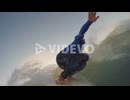 Surfer surfing in sea