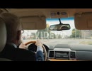 A Handsome Businessman Driving A Car Rides The Streets Of Toronto In Canada