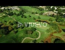 Orbit Shot Of Golf Course With Green Grass