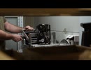 Man labeling beer bottle