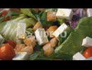 Olive Oil Being Drizzled on a Fresh and Healthy Green Salad