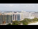 Luxury hotels and apartments of Miami and sandy coastline, aerial view