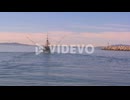 A fishing boat heads out of Santa Barbara Harbor