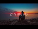 4K UHD Cinemagraph of a young man with a baseball cap sitting