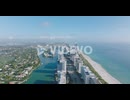 Fly above coastal urban neighbourhood