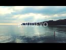 Drone flying forward above the sea at overcast weather