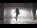 stock-footage-football-freestyle-slow-motion-young-black-man-practices