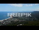 tilting down to reveal vast cityscape of illawarra south coast nsw on sunny day
