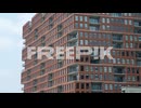 medium shot of a brick apartment building
