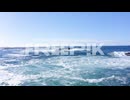 aerial shot flying over rough waters