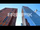 Modern high-rise buildings from low-angle perspective.