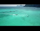 Pileh Lagoon Mountains from the Top Down. World Famous Maya Bay Beach, Wide Pan Left. Ko Phi Phi Le