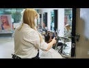 Hairdresser Prepares Woman's Hair for Dyeing in Beauty Salon
