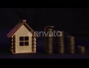 The Severity of the Repayment of a Mortgage or Loan a Man with Shaking Hands Puts a Coin in a Stack