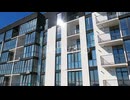 Newly built modern apartment building facade. Exterior of multi storey building.