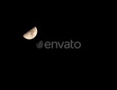 Time lapse of moon at night with a copy space. Half moon with detail surface.