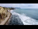 Coastal Cliffside Waves and Beach Scenery