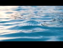Turquoise Water Rippling in the Sunrise or Sunset