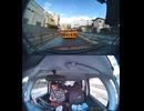 巨大なコンクリートの柱を運ぶオレンジ色のトレーラー【FUSO】