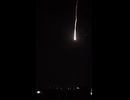 Glowing debris from an intercepted Iranian ballistic missile making an impact in Daara Governorate,