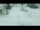 雪の中の面白山高原駅付近を仙山線E721系が進んでゆく