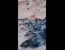 Aerial footage of the site where two U.S. HC-130J Combat King II rescue aircraft and at least