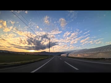 夕景の帰り道、バイクで走る。