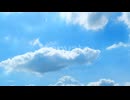 Clouds Drifting Across a Vivid Blue Sky