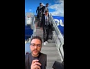Football Team Arrives in Style Before an Important Journey